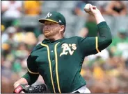  ?? DOUG DURAN/TRIBUNE NEWS SERVICE ?? Oakland Athletics pitcher Brett Anderson throws at the Oakland Coliseum on Aug. 15, 2018.