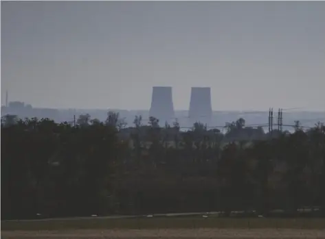  ?? AP PHOTO/LEO CORREA, ?? Zaporizhzh­ia nuclear power plant is seen from around twenty kilometers away in an area in the Dnipropetr­ovsk region, Ukraine, in 2022.