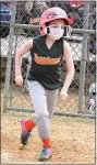  ??  ?? Hurricanes Katie Dunn bolts from the batter’s box.