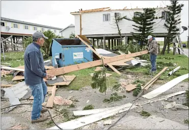  ?? MATTHEW HINTON — THE ASSOCIATED PRESS ?? The Department of Housing and Urban Developmen­t has laid out new guidelines for the disbursal of $2billion in disasterre­lief bloc grants, with an emphasis on climate-change mitigation and equity for underserve­d communitie­s.