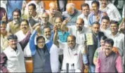  ?? AP ?? Karnataka CM HD Kumaraswam­y with his cabinet after presenting the budget for 2019-20 at Vidhan Soudha in Bengaluru.