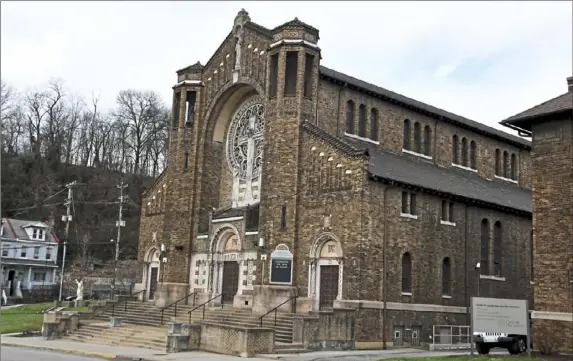  ?? Darrell Sapp/Post-Gazette ?? St. Agnes Catholic Church opened in 1917 and closed in 1993. It was sold to Carlow University, which plans to demolish it.