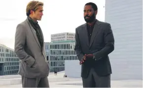  ??  ?? Robert Pattinson and John David Washington in Christophe­r Nolan’s
Tenet