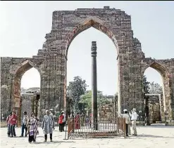  ??  ?? the Iron Pillar dedicated to Lord Vishnu has mystified scientists as it has existed for 1,600 years without rusting.