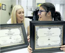  ?? CLIFFORD SKARSTEDT/EXAMINER ?? Match of The Year Award recipients Julia Marino, left, and Lydia Colvin were honoured during the Heads Up for Inclusion event honouring volunteers for their contributi­ons to the Amigos in the Community Program on Friday at Empress Gardens ahead of...