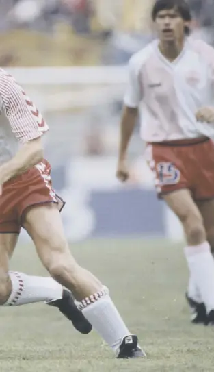  ??  ?? Alex Mcleish battles with Denmark striker Michael Laudrup during Scotland’s opening game of the 1986 World Cup finals in Mexico. Mcleish’s adventure was short-lived, however, as he was struck down by illness and did not feature in the rest of the group campaign.
