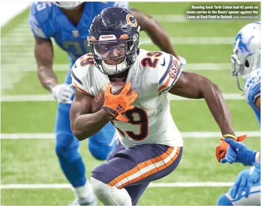  ?? RICK OSENTOSKI/AP ?? Running back Tarik Cohen had 41 yards on seven carries in the Bears’ opener against the Lions at Ford Field in Detroit.