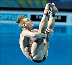  ??  ?? Holding on for gold: Jack Laugher added the Commonweal­th title to his collection