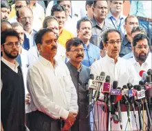  ??  ?? Maharashtr­a Chief Minister Uddhav Thackeray along with party MLAs addresses a news conference during the second day of the Winter Session of the State Assembly, at Vidhan Bhawan in Nagpur, on Tuesday