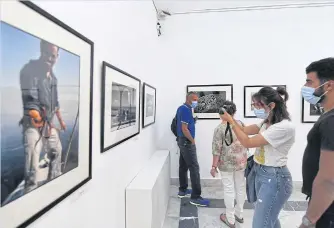  ?? ?? Guests on the opening day of the exhibition at Kheireddin­e Palace in Tunis, on Friday.