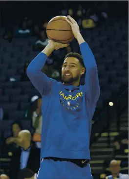  ?? JANE TYSKA — BAY AREA NEWS GROUP, FILE ?? The Warriors’ Klay Thompson warms up before their game against the Magic in November 2018.