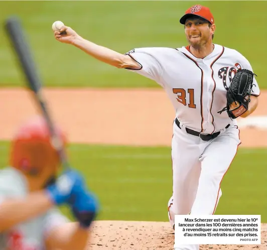  ?? PHOTO AFP ?? Max Scherzer est devenu hier le 10e lanceur dans les 100 dernières années à revendique­r au moins cinq matchs d’au moins 15 retraits sur des prises.