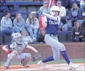  ?? Scott Herpst ?? Gordon Lee’s Landon Norton swings for the fences in front of Heritage catcher Landon Summers during a contest in Chickamaug­a last week.