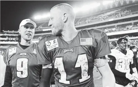  ?? ASSOCIATED PRESS FILE PHOTO ?? Nick Foles, left, is standing by for the Philadelph­ia Eagles as starting quarterbac­k Carson Wentz works to recover from knee surgery.