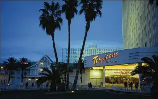  ?? JOHN LOCHER/AP ?? The Tropicana, which closed Tuesday, is one of the last vestiges of what Vegas once was.