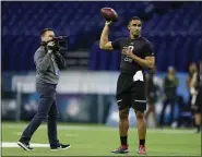  ?? CHARLIE NIEBERGALL — THE ASSOCIATED PRESS ?? Oklahoma quarterbac­k Jalen Hurts runs a drill at the NFL combine in Indianapol­is.