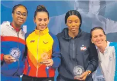  ?? ?? Heyddys Valentín , en foto de archivo, recibe la medalla de bronce en el clasificat­orio de Costa Rica.