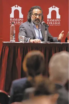  ?? PHOTOS BY ANNE-MARIE CARUSO/NORTHJERSE­Y.COM ?? Jacob Ari Labendz, Director of the Gross Center for Holocaust and Genocide Studies at Ramapo College, facilitate­s a talk called “Meaningful­ly Discussing Palestine/Israel after October 7” in the student center.