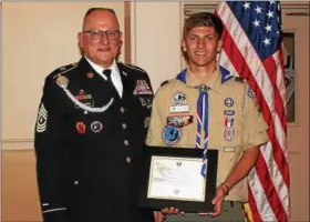  ?? SUBMITTED PHOTO ?? Pictured with Derek Sadler at the banquet is Sergeant Major Matthew Hensinger, of the Pennsylvan­ia Air National Guard who presented Derek with the National Eagle Scout Service Project of the Year Award.