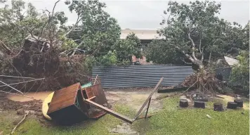  ??  ?? PACKING PUNCH: Damage yesterday from the tropical low that passed over Mornington Island.