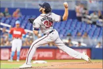  ?? Sam Navarro-USA TODAY Sports ?? Atlanta Braves starting pitcher Ian Anderson delivers a pitch during the first inning against the Miami Marlins at loanDepot Park.