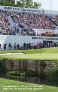  ??  ?? Francesco Molinari of Italy plays his fourth shot on the 18th hole during the final round