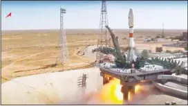  ?? (AP) ?? In this handout photo taken from video released by Roscosmos on Tuesday, Aug. 9, 2022, a Russian Soyuz rocket lifts off to carry Iranian Khayyam satellite into orbit at the Russian-leased Baikonur cosmodrome near Baikonur, Kazakhstan.