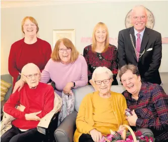  ??  ?? Special day Jean celebrates with family and friends at Fairview Care Home