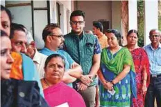  ?? PTI ?? The scion of the Mysuru royal family, Yaduveer Krishnadat­ta Chamaraja Wadiyar, waits to cast his ballot in Mysore yesterday.