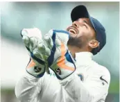  ?? AFP ?? Safe hands: Rishabh Pant equalled a record in only his sixth Test match.