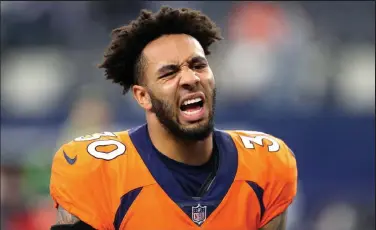  ?? Richard Rodriguez / Getty Images ?? The Broncos’ Caden Sterns reacts after defeating the Cowboys 30-16 at AT&T Stadium on Sunday in Arlington, Texas.