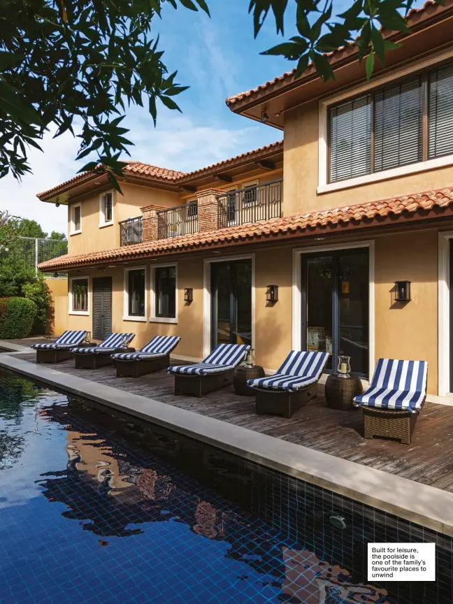  ??  ?? Built for leisure, the poolside is one of the family’s favourite places to unwind