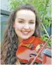  ??  ?? Claire Frances MacNeil of An Gearasdan was placed first in the fiddle advanced.