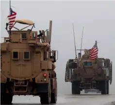  ?? — AFP photo ?? File photo shows a line of US military vehicles in Syria’s northern city of Manbij. In his address at the conference in New Delhi, Anwar criticised the US-led wars for causing widespread destructio­n.