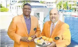  ?? KARA STARZYK/COURTESY ?? Sean Pittman, left, and Frank Gonzalez promote the 2017 Orange Bowl Food and Wine Celebratio­n, set for May 19 at the Broward County Convention Center.