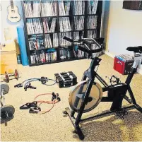  ?? ERNIE SCHRAMAYR PHOTO ?? One of the ways to make your exercise sessions more efficient is to have a space that you keep clean and organized with all of your equipment easily accessible.