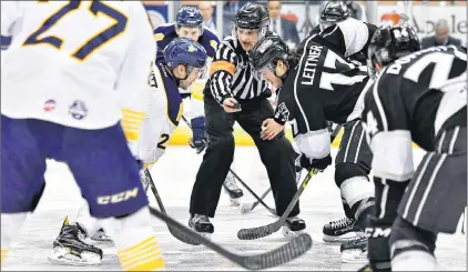  ?? MANCHESTER MONARCHS/DAVE HILTON/FACEBOOK @MONARCHS HOCKEY ?? Manchester Monarchs centre Matt Leitner (17) and Tommy Schutt of the Norfolk Admirals prepare for the opening faceoff in an ECHL game in Manchester, N.H., earlier this season. The ECHL announced Tuesday that it has formally approved an expansion...