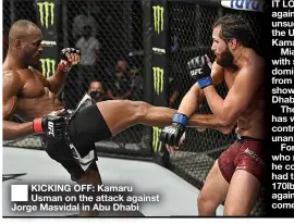  ??  ?? KICKING OFF: Kamaru Usman on the attack against Jorge Masvidal in Abu Dhabi