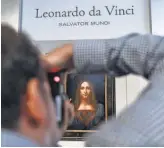  ?? JEWEL SAMAD, AFP/ GETTY IMAGES ?? Leonardo da Vinci’s Salvator Mundi is unveiled at Christie’s in New York on Oct. 10. It’s the only one of 20 paintings by da Vinci in private hands.