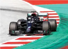  ?? — AFP photo ?? Hamilton steers his car during the Austrian Formula One Grand Prix race in Spielberg, Austria.