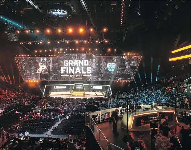  ?? — THE ASSOCIATED PRESS FILES ?? Fans fill the Barclays Center in Brooklyn for the Overwatch League Grand Finals’ first night of competitio­n earlier this summer. The Overwatch League, which has attracted teams from Europe, North America and Asia, is pushing ambitious expansion plans.