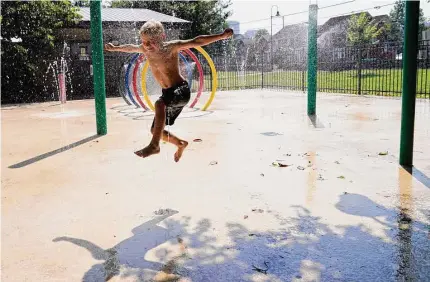  ?? George Walker IV/Associated Press ?? Cannon Brown, 5, runs through the water at a local park’s splash pad Friday in Nashville, Tenn. In Tennessee and nearby states, forecaster­s warned that heat indexes could rise above 110 degrees Fahrenheit as extreme weather impacts much of the central U.S.