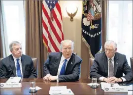  ?? Evan Vucci Associated Press ?? PRESIDENT TRUMP, with Sen. Richard J. Durbin (D-Ill.), left, and Rep. Steny H. Hoyer (D-Md.), said the federal court system was “broken and unfair.”