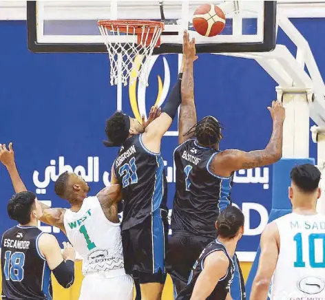  ?? UAE BASKETBALL ASSOCIATIO­N FACEBOOK ?? Strong Group imports Andre Roberson and Andray Blatche crash the boards in the team’s continuing surge.