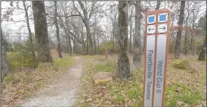  ?? (NWA Democrat-Gazette/Flip Putthoff) ?? Trails at Centennial Park and Kessler Mountain will test trail runners day and night.