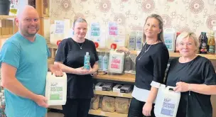  ??  ?? Switching over (L-r): The Bee’s Flower Shop owner Craig Burnett with members of the housekeepi­ng team from the New County Hotel in Perth, Julie Brodie, Karlolina Leska and Gizella Takacs. The hotel has started using refills for its items