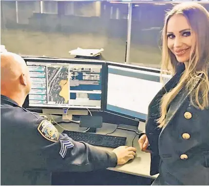  ??  ?? SNEAKY PEEKY: German adult-film actress Annina Ucatis posted on Instagram these pics of her highly unusual private tour of NYPD Headquarte­rs last week — in which the sexpot was granted access to sensitive areas of the building,including a monitoring station (above) and outside the commission­er’s office (below).