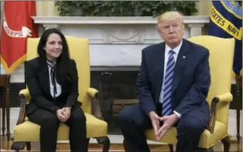  ?? SUSAN WALSH - THE ASSOCIATED PRESS ?? President Donald Trump meets with Aya Hijazi, an Egyptian-American aid worker, in the Oval office of the White House in Washington, Friday. Hijazi, an Egyptian-American charity worker was freed after nearly three years of detention in Egypt returning...