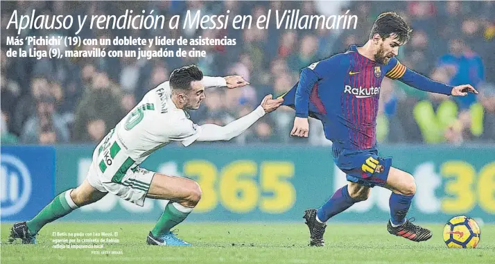  ?? FOTO: GETTY IMAGES ?? El Betis no pudo con Leo Messi. El agarrón por la camiseta de Fabián refleja la impotencia local
