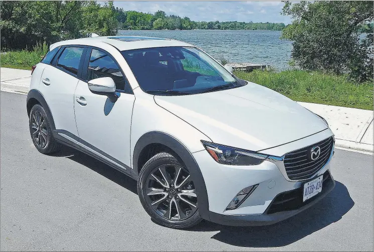  ?? — BRIAN HARPER/DRIVING ?? Muscularly attractive, the 2016 Mazda CX-3 GT is powered by a 146-hp four that delivers agile, spirited driving both in the city and on the highway.